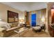 Relaxing living room features comfortable seating, soft lighting, and panoramic city views at 125 E Harmon Ave # 3406 & 3408, Las Vegas, NV 89109