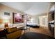 Relaxing living space with a seating area, sleeping area, and convenient kitchenette at 125 E Harmon Ave # 3406 & 3408, Las Vegas, NV 89109