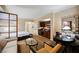 Cozy living space with sleeping area featuring a comfortable seating arrangement and a modern kitchenette at 125 E Harmon Ave # 3406 & 3408, Las Vegas, NV 89109