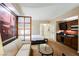 Contemporary suite featuring bedroom, living space, and kitchenette at 125 E Harmon Ave # 3406 & 3408, Las Vegas, NV 89109