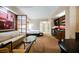 Open-concept suite with a bedroom, living space, kitchenette, and modern amenities at 125 E Harmon Ave # 3406 & 3408, Las Vegas, NV 89109