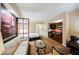 Well-designed suite featuring a bedroom, living area, kitchenette, and stylish decor at 125 E Harmon Ave # 3406 & 3408, Las Vegas, NV 89109