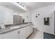 Neutral bathroom with grey-toned vanity and mirror and shower stall at 1364 Cerulean Ave, Henderson, NV 89002