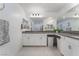 Bright bathroom with a white double sink vanity and granite counters at 1364 Cerulean Ave, Henderson, NV 89002