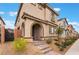 Charming two-story stucco home with an arched entry and well-maintained landscaping in a desirable neighborhood at 1364 Cerulean Ave, Henderson, NV 89002