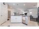 Open concept kitchen with granite countertops and stainless steel dishwasher at 1364 Cerulean Ave, Henderson, NV 89002