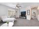 Cozy living room features large window and comfortable seating area at 1364 Cerulean Ave, Henderson, NV 89002