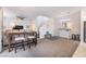 Bright living room with kitchen access, features stylish furniture and decor, perfect for modern living at 1364 Cerulean Ave, Henderson, NV 89002