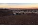 Scenic aerial view of the community, highlighting its location among rolling hills and mountains at 176 Brighton Hills Ave, Henderson, NV 89002