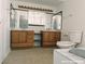 Bathroom featuring dual vanities and an extra large mirror at 1828 Casa Vista Dr, Las Vegas, NV 89146