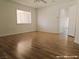 Sun-filled bedroom with wood floors, a ceiling fan and an inviting atmosphere at 1828 Casa Vista Dr, Las Vegas, NV 89146