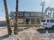 Two-story home featuring a front porch with white iron fencing and a gravel front yard at 1828 Casa Vista Dr, Las Vegas, NV 89146