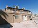 A unique two-story house boasts a rooftop deck and a cozy patio below, perfect for outdoor relaxation at 1828 Casa Vista Dr, Las Vegas, NV 89146