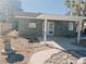 Unique home featuring rock siding, a covered patio, and desert landscaping at 1828 Casa Vista Dr, Las Vegas, NV 89146