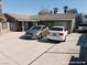 Charming single-story home with stone facade and a spacious driveway and two cars at 1828 Casa Vista Dr, Las Vegas, NV 89146