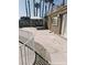 A concrete patio with canopy in the backyard offers an outdoor living and entertaining space at 1828 Casa Vista Dr, Las Vegas, NV 89146