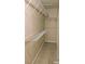 Small walk-in closet with white wire shelving and ample storage space at 1828 Casa Vista Dr, Las Vegas, NV 89146