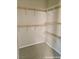 Spacious walk-in closet with white wire shelving and ample storage space at 1828 Casa Vista Dr, Las Vegas, NV 89146