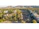 An aerial view of the golf course community with custom homes and lush landscaping at 2041 Troon Dr, Henderson, NV 89074