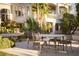 Backyard patio with seating area, lush landscaping and water feature create a relaxing retreat at 2041 Troon Dr, Henderson, NV 89074