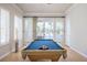 Bright game room with a pool table and ample natural light at 2041 Troon Dr, Henderson, NV 89074