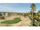 Lush golf course homesite surrounded by mature trees and landscaping with mountain views at 2041 Troon Dr, Henderson, NV 89074