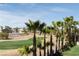 Beautiful golf course homesite surrounded by mature landscaping, with homes in the distance at 2041 Troon Dr, Henderson, NV 89074