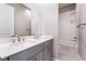 Dual sink bathroom featuring modern hardware and plenty of counter space, plus a shower/tub combination at 2509 Silent View Ave, Henderson, NV 89044