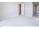 Bedroom with carpet, neutral paint, and an en suite bathroom with glass shower at 2509 Silent View Ave, Henderson, NV 89044