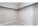 Walk-in closet with carpeted floor and a hanging rack at 2509 Silent View Ave, Henderson, NV 89044
