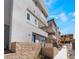 Stylish townhome exterior with a private entrance and modern architectural details at 2509 Silent View Ave, Henderson, NV 89044