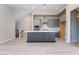 Modern kitchen features a large island, stainless steel appliances, and sleek gray cabinetry at 2509 Silent View Ave, Henderson, NV 89044