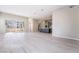 Open-concept living space with a modern kitchen and a patio at 2509 Silent View Ave, Henderson, NV 89044