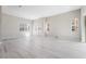 Spacious living room with wood-look floors and abundant natural light at 2509 Silent View Ave, Henderson, NV 89044