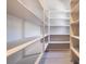 Walk-in pantry featuring bright white shelving and plenty of storage space at 2509 Silent View Ave, Henderson, NV 89044