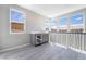 Stylish wet bar with mini fridge and sink, complemented by natural light through windows at 2509 Silent View Ave, Henderson, NV 89044