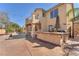 The backyard patio features an outdoor kitchen and a second story balcony at 2566 Antique Blossom Ave, Henderson, NV 89052