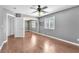 Bedroom with neutral paint, sliding closet, and updated flooring at 2566 Antique Blossom Ave, Henderson, NV 89052
