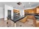 Gourmet kitchen featuring stainless steel appliances and a large center island at 2566 Antique Blossom Ave, Henderson, NV 89052
