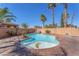 Relaxing pool area featuring palm trees and a decorative palm tree inlay at 2566 Antique Blossom Ave, Henderson, NV 89052