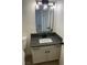 Bathroom featuring vanity with modern lighting and a grey countertop at 2621 Adelante Ave # 102, Las Vegas, NV 89106