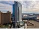 Stunning aerial view of the high-rise building, pool, and surrounding Las Vegas cityscape at 2700 Las Vegas Blvd # 1202, Las Vegas, NV 89109