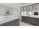 Stylish bar area with plenty of counter space, under cabinet lighting, glass display shelves and mirrored backsplash at 2700 Las Vegas Blvd # 1202, Las Vegas, NV 89109