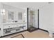 Bright bathroom featuring a glass shower, double vanity, and neutral color palette at 2700 Las Vegas Blvd # 1202, Las Vegas, NV 89109
