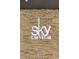 Illuminated SKY Las Vegas sign on a textured stone wall, creating a sophisticated ambiance at 2700 Las Vegas Blvd # 1202, Las Vegas, NV 89109