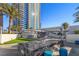 Wonderful community area featuring an outdoor fireplace, grilling area, and seating at 2700 Las Vegas Blvd # 1202, Las Vegas, NV 89109