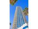 Modern high-rise exterior with balconies and vibrant blue glass at 2700 Las Vegas Blvd # 1202, Las Vegas, NV 89109