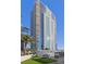Striking high-rise with balconies, landscaping, and putting green against a clear blue sky at 2700 Las Vegas Blvd # 1202, Las Vegas, NV 89109
