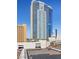 Modern high-rise exterior with blue tinted windows and white balcony accents at 2700 Las Vegas Blvd # 1202, Las Vegas, NV 89109