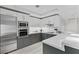 Modern kitchen boasts stainless steel appliances, sleek cabinets, and quartz countertops at 2700 Las Vegas Blvd # 1202, Las Vegas, NV 89109